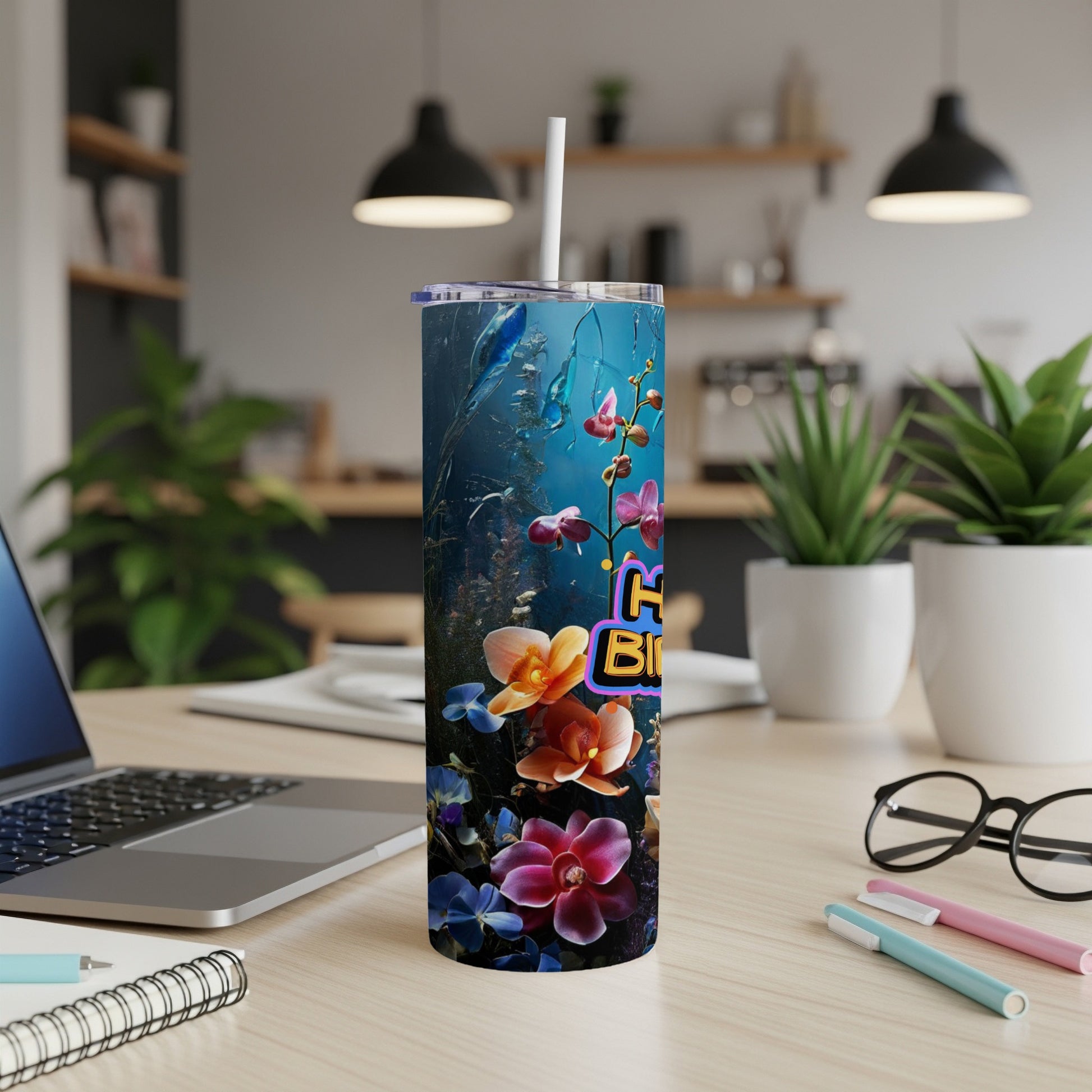 Tumbler with "Happy Birthday" and floral design.