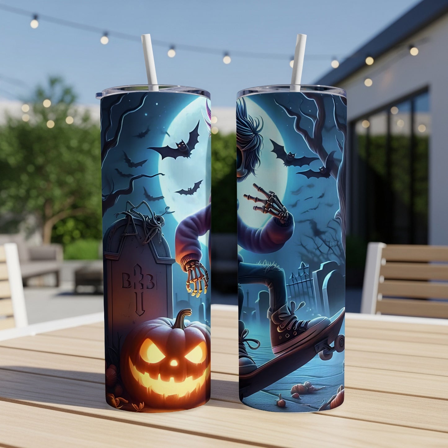 Halloween tumblers with a skeleton on a skateboard and carved pumpkin design.