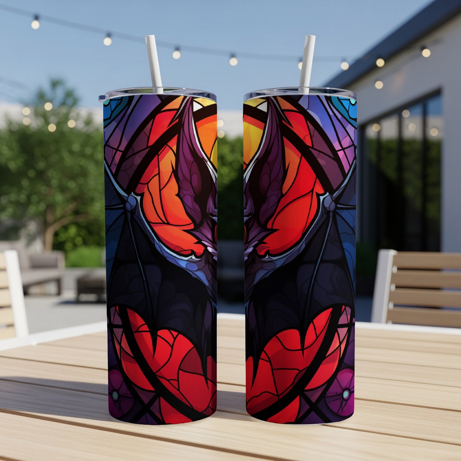 Two tumblers with a stained-glass bat and heart design.