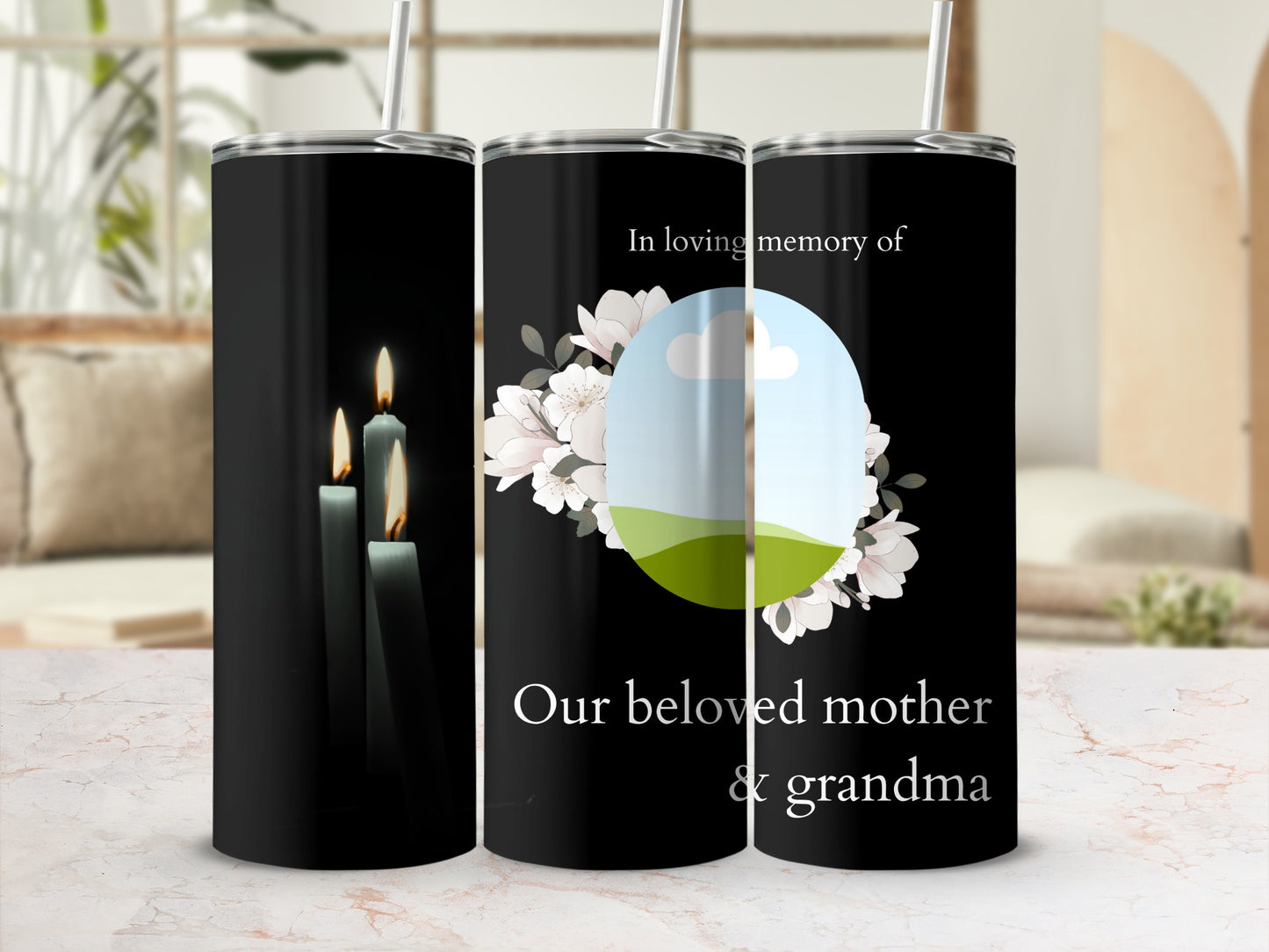 Tumbler with lit candles and "In loving memory of our beloved mother & grandma" text.