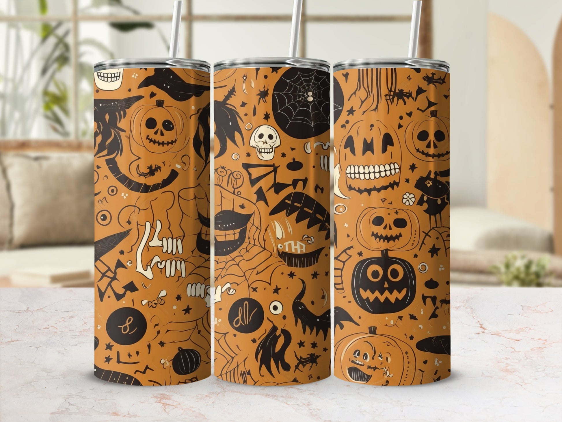 Orange tumblers with Halloween designs of pumpkins, skulls, bats, and spiders.