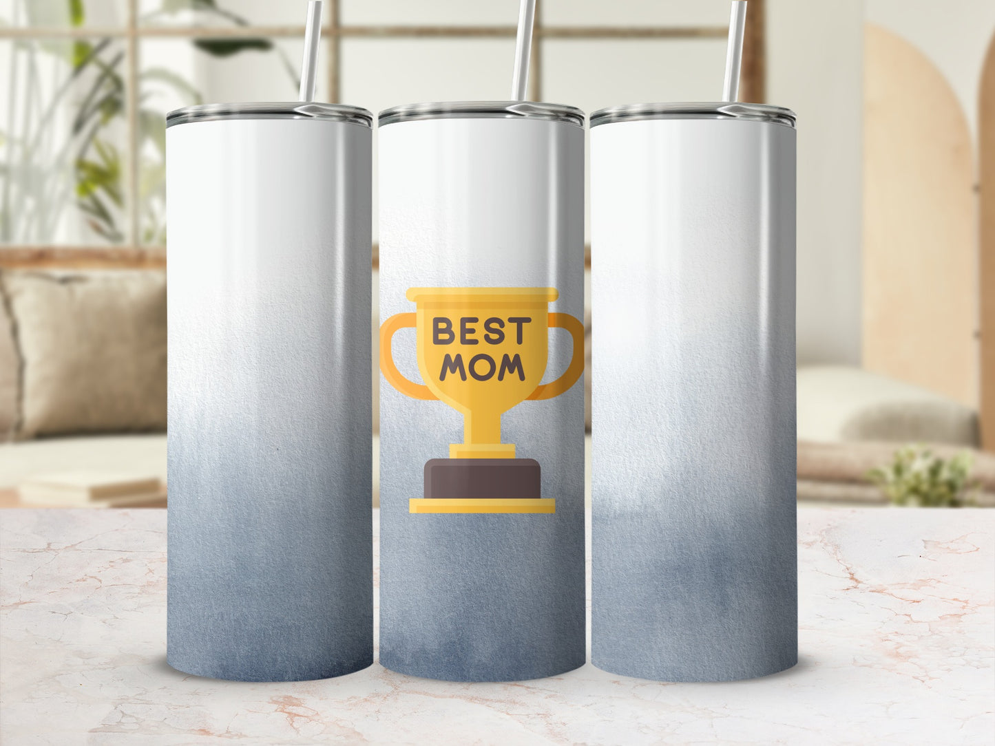 Trophy graphic with "BEST MOM" text on a blue gradient skinny tumbler.