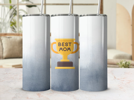 Trophy graphic with "BEST MOM" text on a blue gradient skinny tumbler.