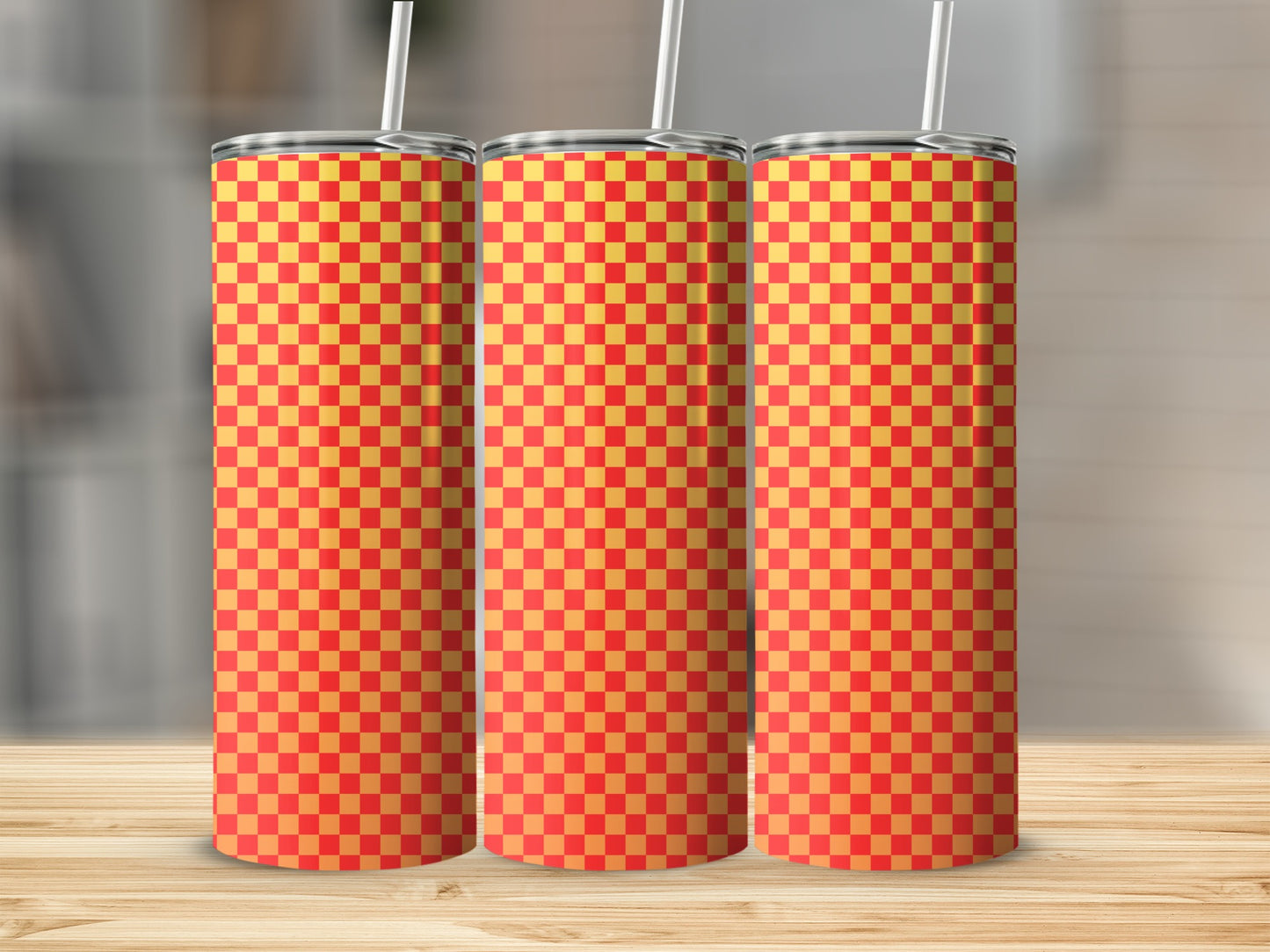 Three tall, skinny tumblers with a red and yellow checkerboard pattern.