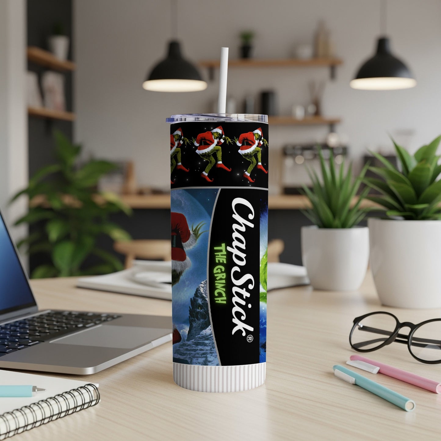 The Grinch ChapStick tumbler features the Grinch character and festive holiday graphics.