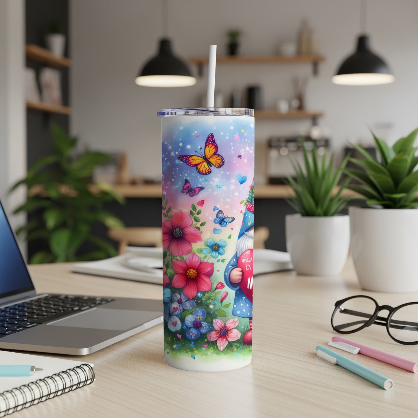 Gnome with hearts and butterflies on a floral patterned tumbler.