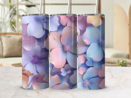 Three tumblers with floral designs in shades of purple, pink, and blue.