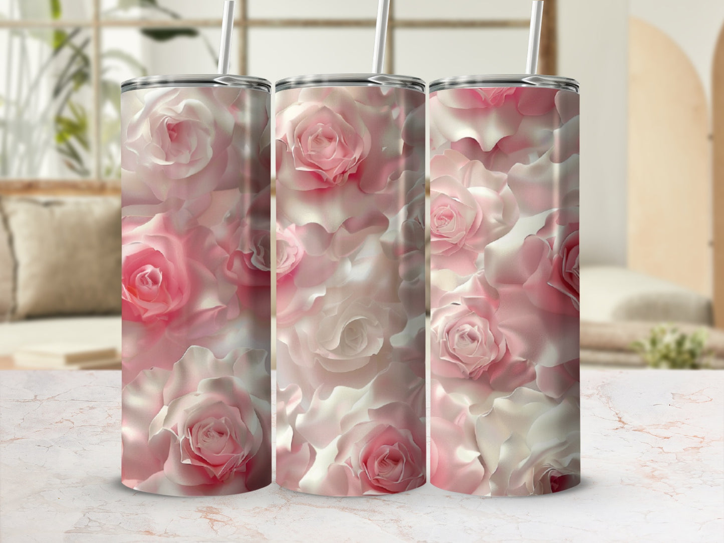 Three tumblers with a soft pink and white rose floral pattern.