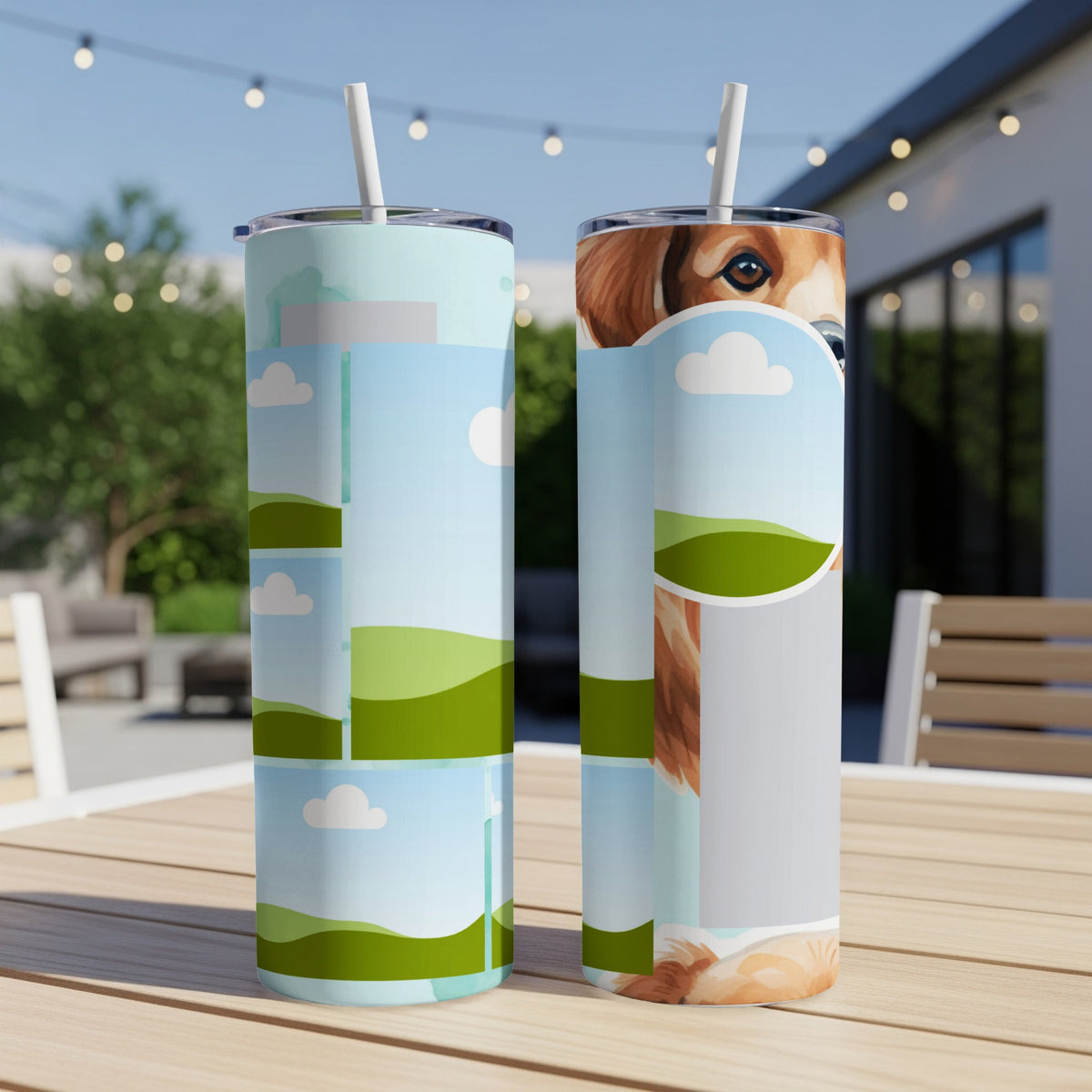 Two skinny tumblers with sky, cloud, and grassy hill designs, one featuring a dog's face.