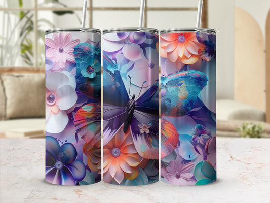 Three tumblers with floral and butterfly designs arranged in a row.