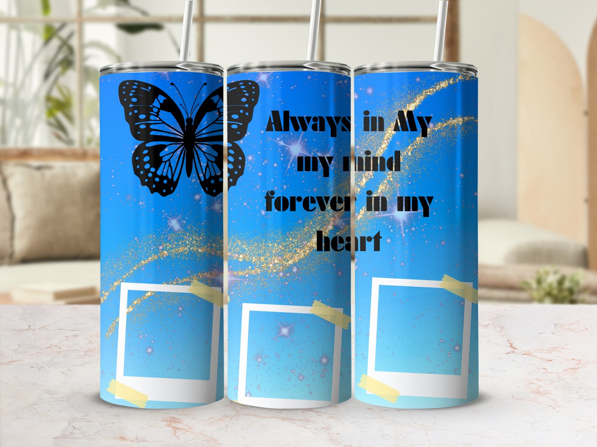 Blue tumbler with butterfly, stars, and text "Always in My mind forever in my heart."