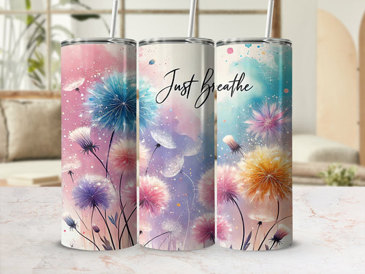 Three tumblers featuring dandelion designs and "Just Breathe" text.