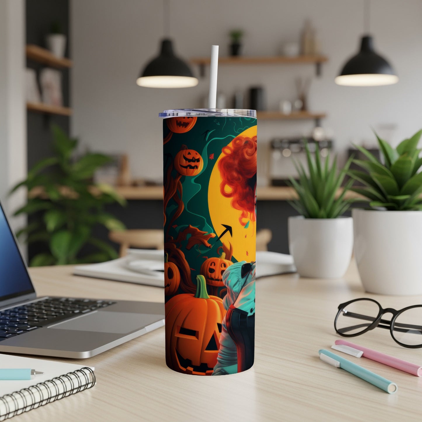 Halloween tumbler with jack-o'-lanterns, a spooky moon, and a figure against a dark green background.