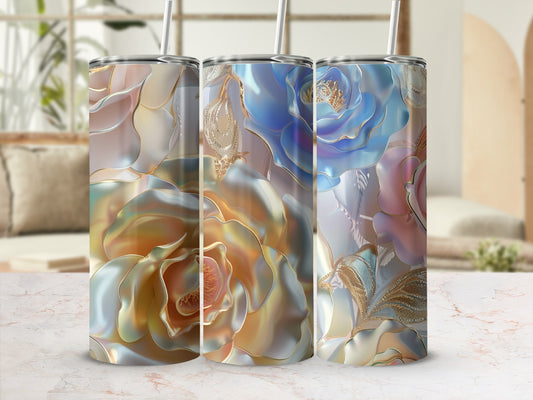 Three tumblers with iridescent floral designs in a soft focus room.
