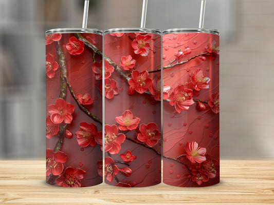 Three red tumblers with a detailed cherry blossom floral pattern.
