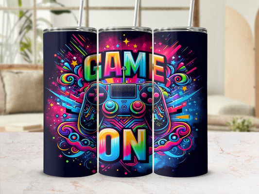 Dark tumbler with colorful "GAME ON" text and video game controller design.