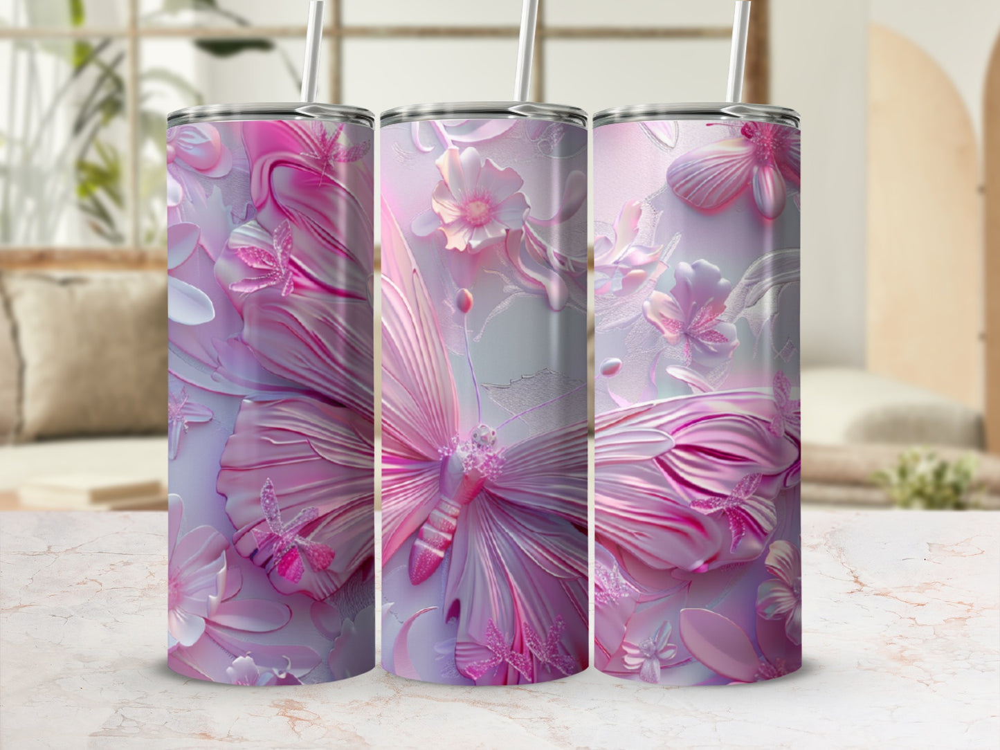 Three tumblers with pink butterfly and floral embossed designs.