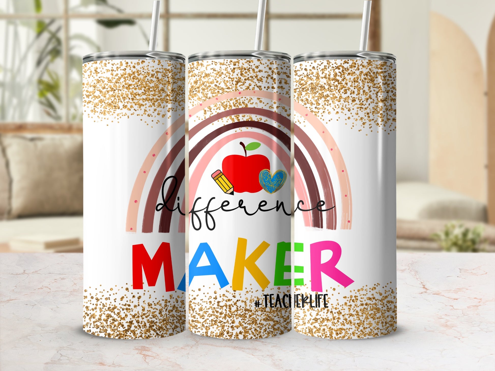 Tumbler with rainbow, apple, and "Difference Maker" text.