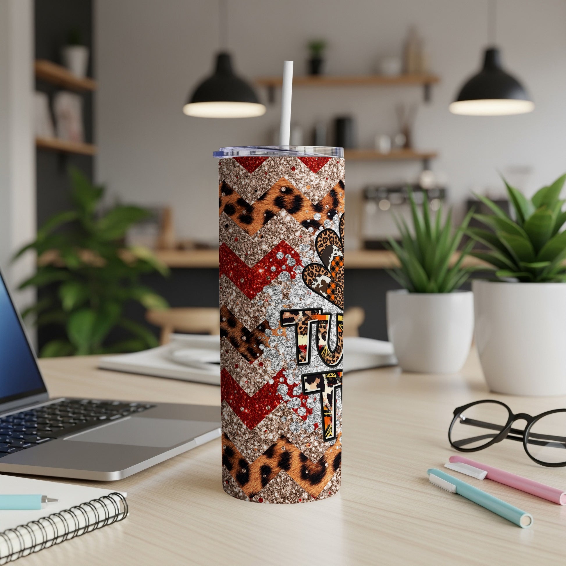 Glittery tumbler with leopard print and chevron patterns, "Tutu Cute" text.