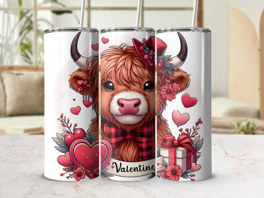 Valentine Highland cow tumbler with red hat, hearts, and gifts.