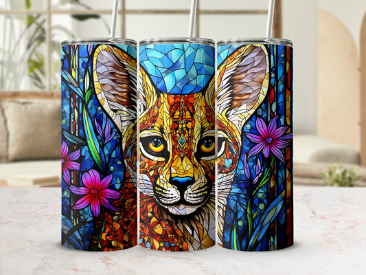 Colorful stained glass fox design on three skinny tumblers with straws.