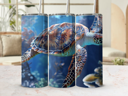 Three tumblers with sea turtle designs displayed on a marble surface.