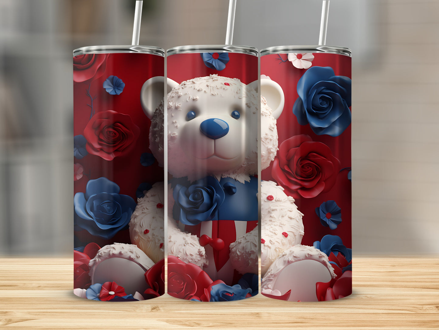 White teddy bear with red and blue roses on a tumbler.