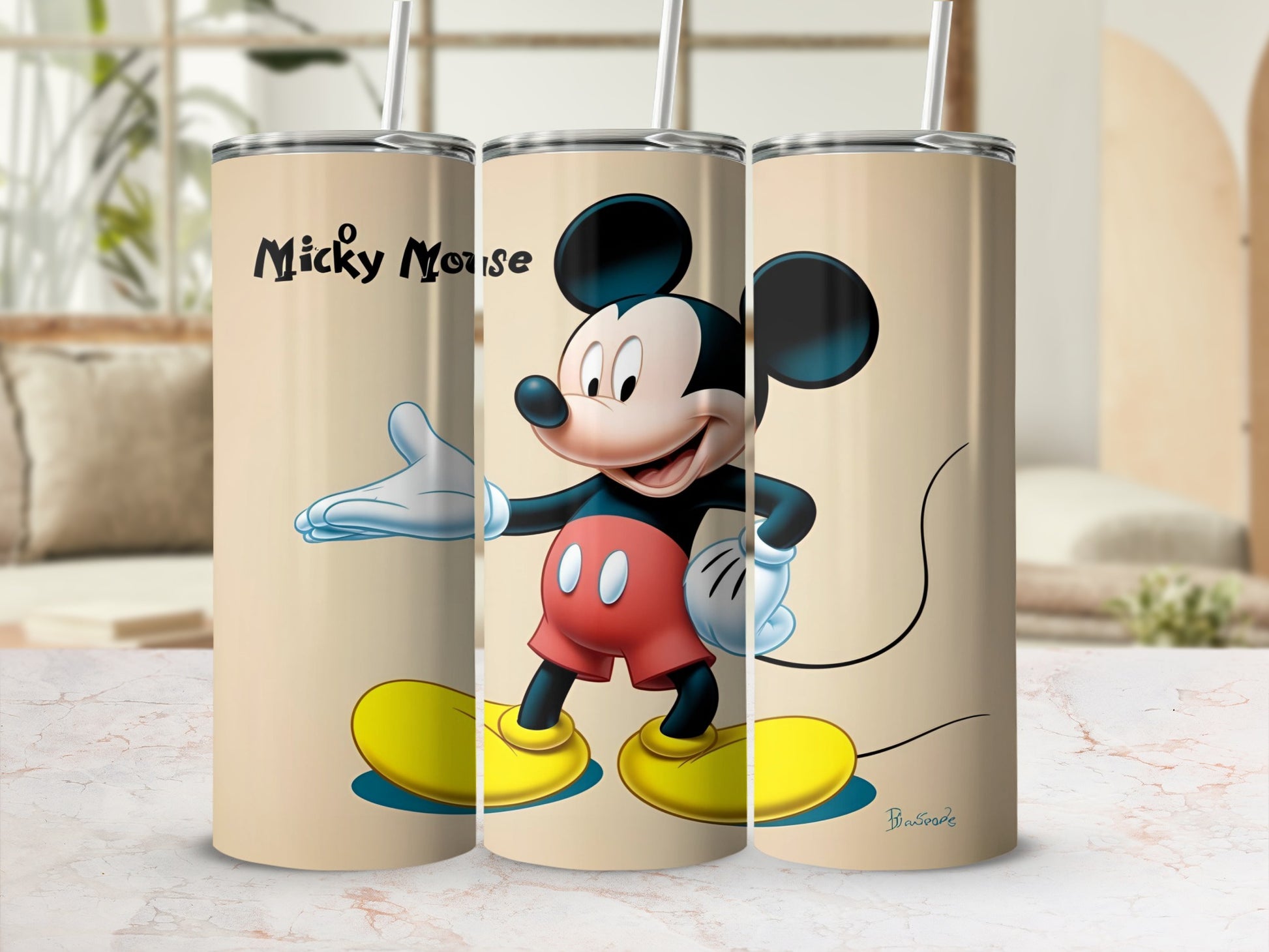 Mickey Mouse illustration on a beige tumbler with straw.