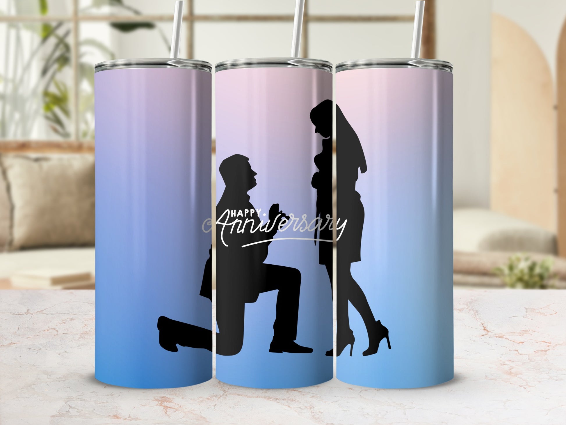 Three tumblers with a silhouette of a proposal and "Happy Anniversary" text.