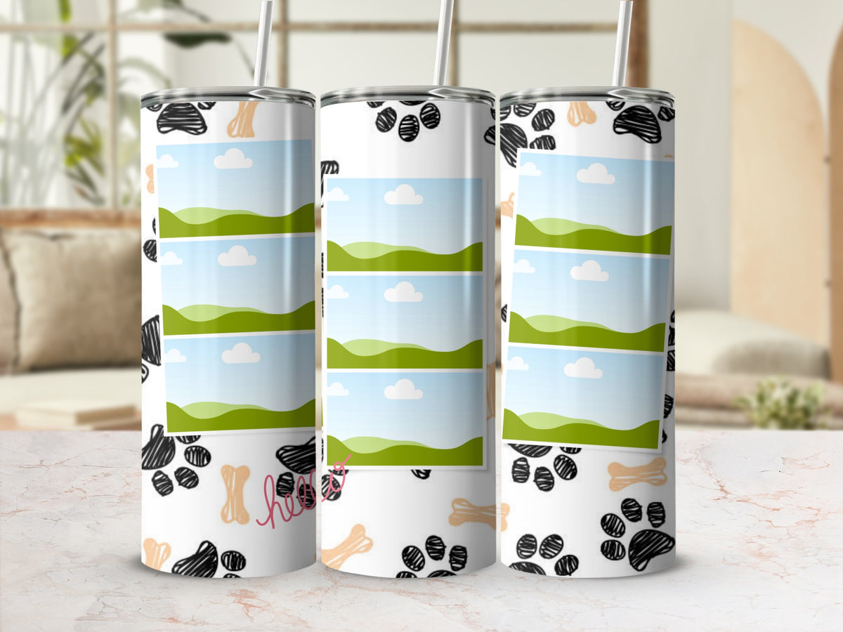 Three tumblers with paw print and bone pattern, and stacked landscape photo frames.