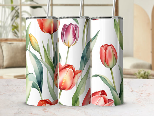 Three tumblers with vibrant red and pink tulip floral patterns.