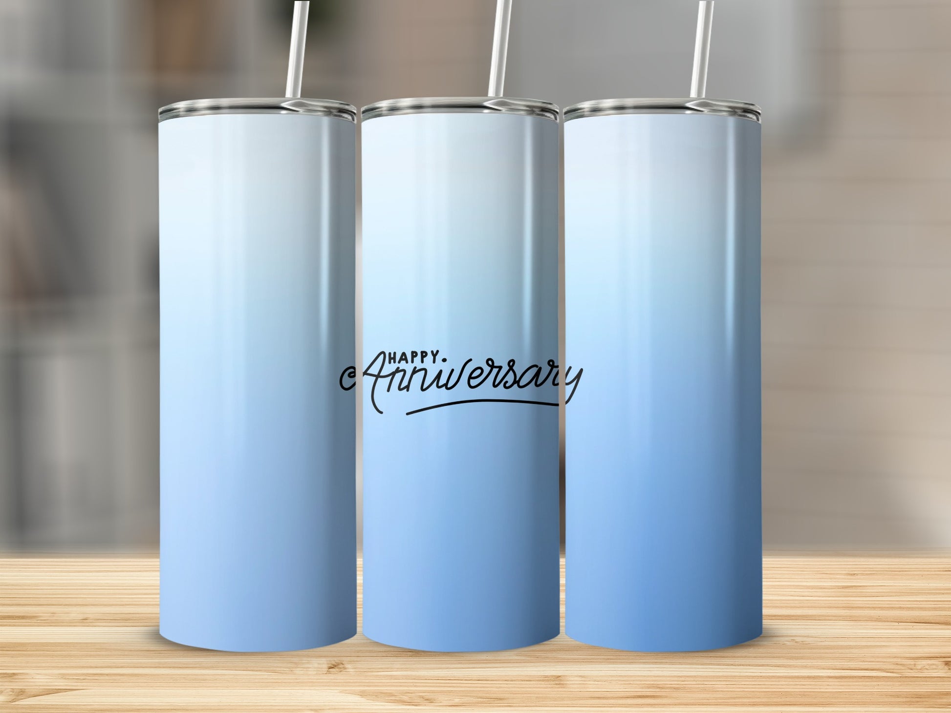 Three tall tumblers with a blue gradient and "Happy Anniversary" text.