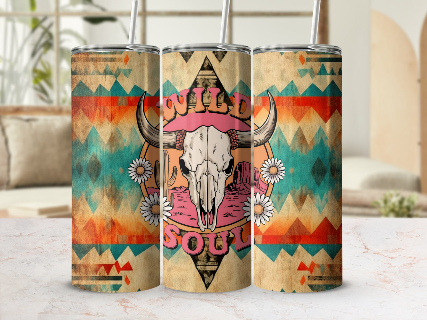 Cow skull with flowers and geometric patterns on a tumbler.