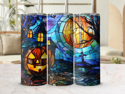 Halloween tumbler set with stained glass art of a haunted house, pumpkin, and moonlit graveyard.
