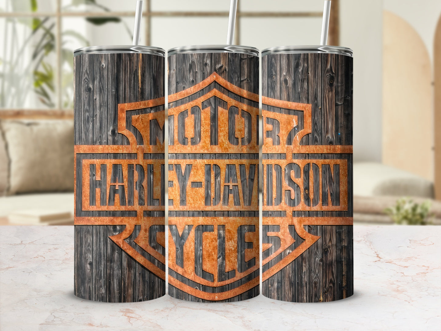 Three tumblers featuring the Harley-Davidson Cycles logo on a wood grain background.