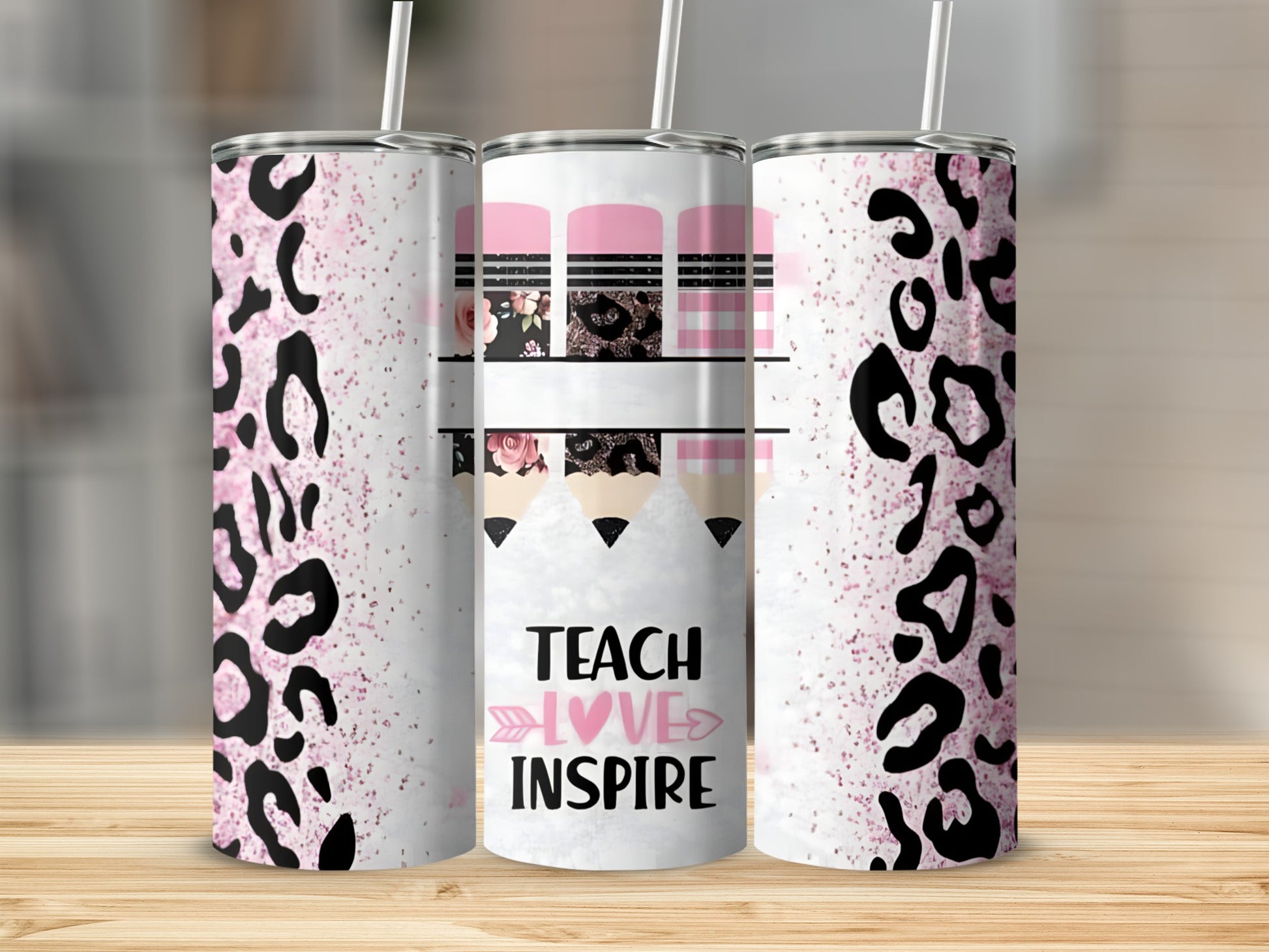 Tumbler with leopard print, pink glitter, and "Teach Love Inspire" text.