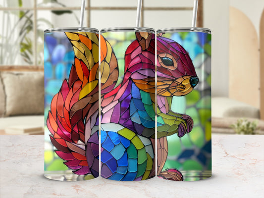 Stained glass squirrel tumbler with colorful segmented body and straw.