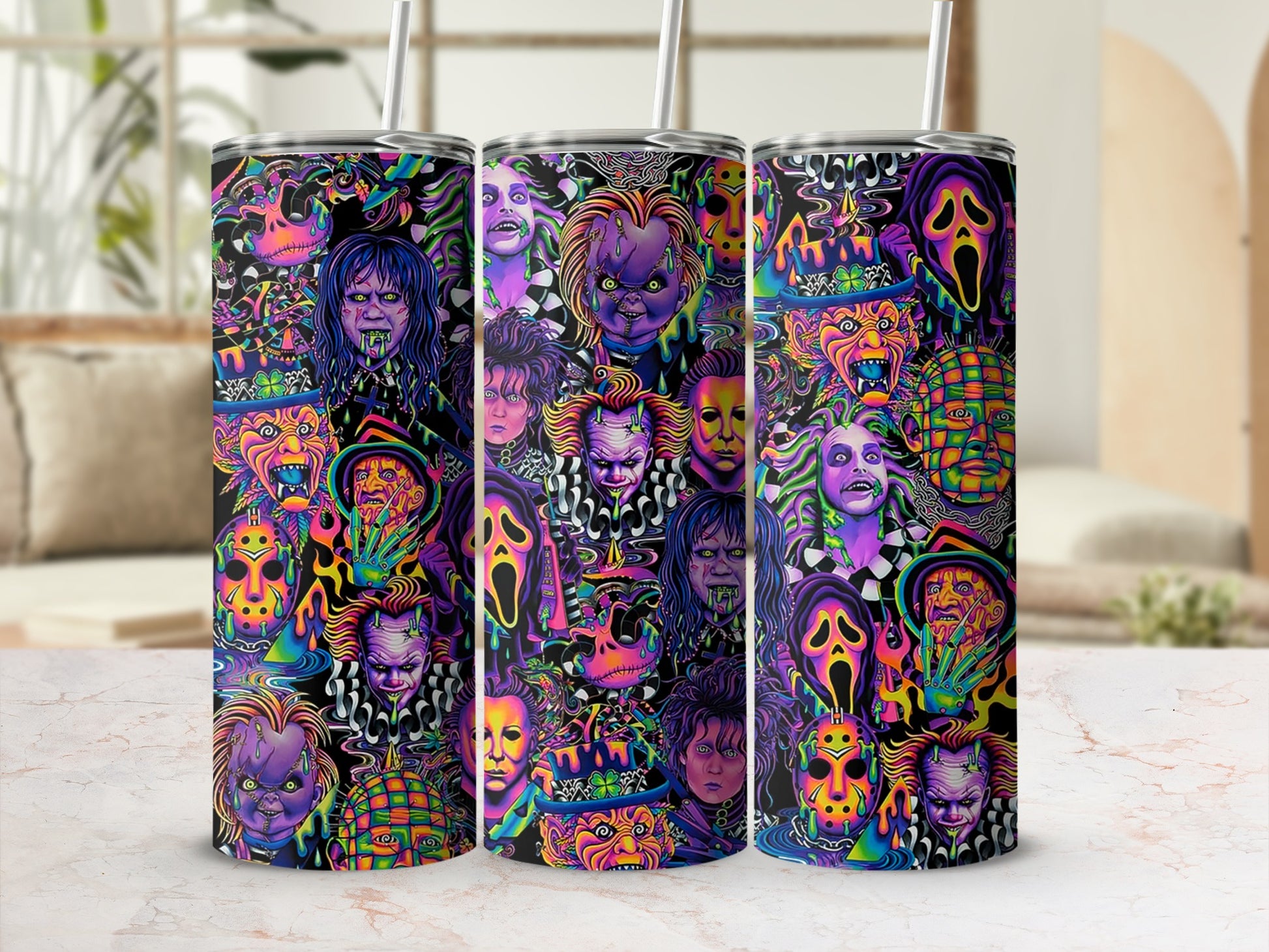 Three tumblers with colorful horror movie character collage pattern.