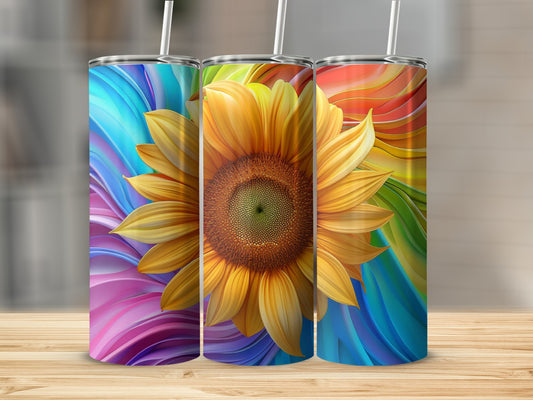 Three tumblers with sunflower and rainbow swirl designs.
