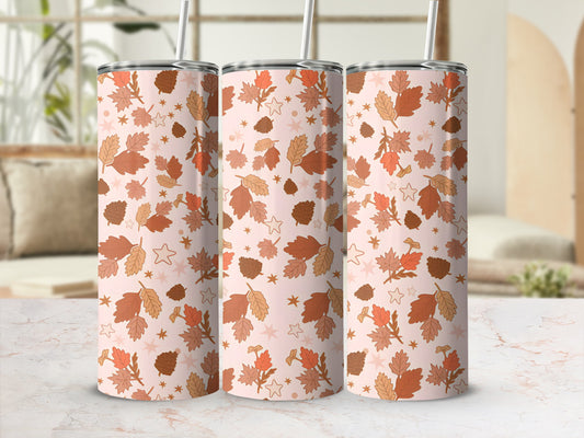 Three tumblers with a muted autumn leaf and star pattern.