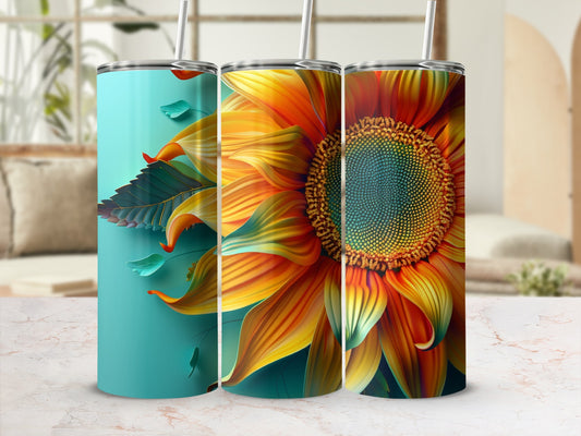 Three tumblers with sunflower and leaf designs on teal backgrounds.