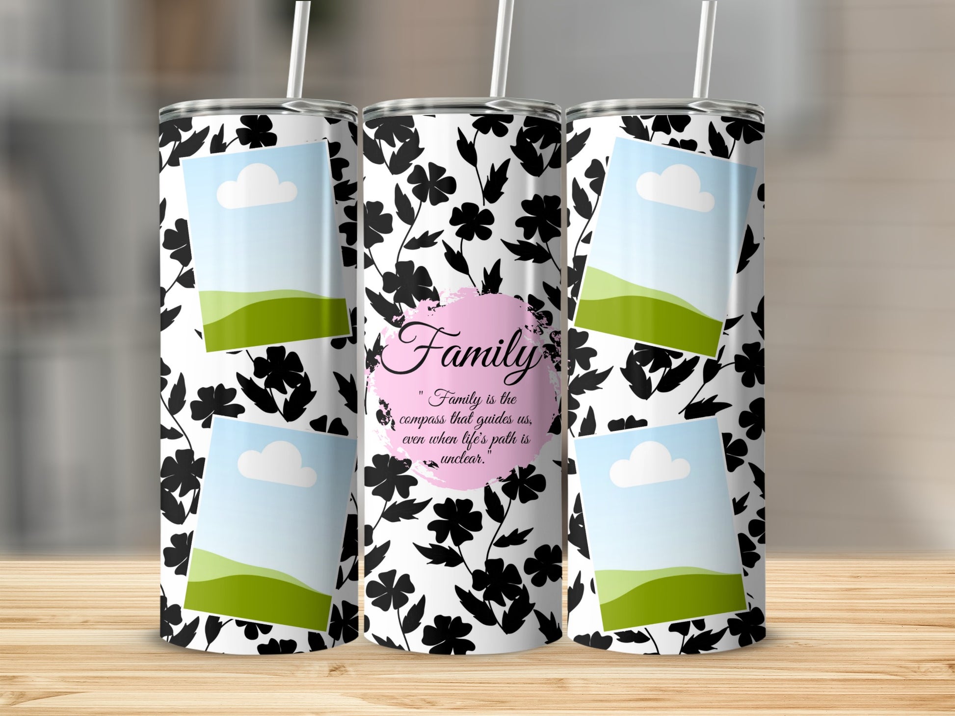 Tumblers with black floral pattern, photo frames, and the text "Family is the compass that guides us".
