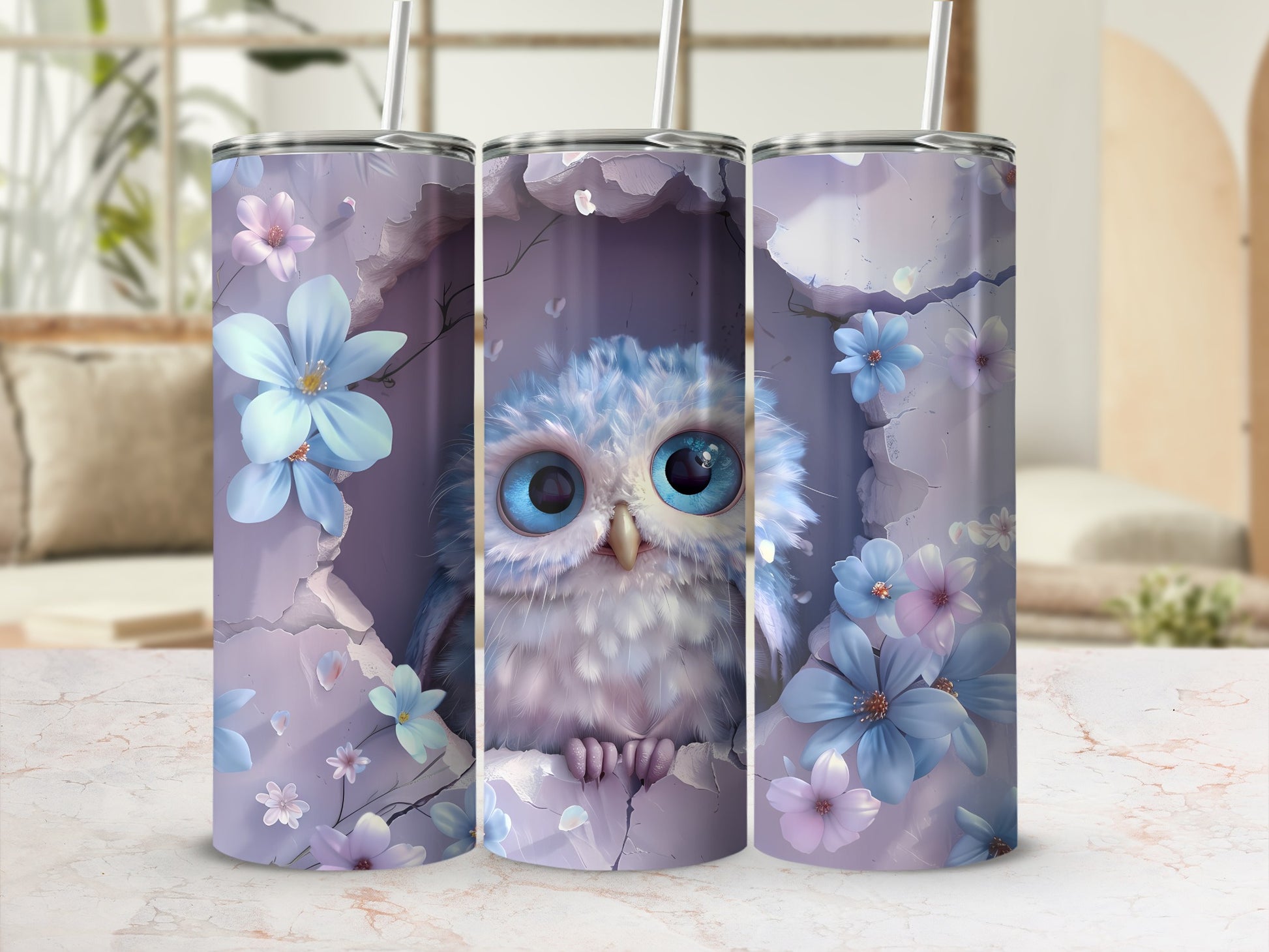 Three tumblers decorated with a fluffy baby owl among purple and blue flowers.