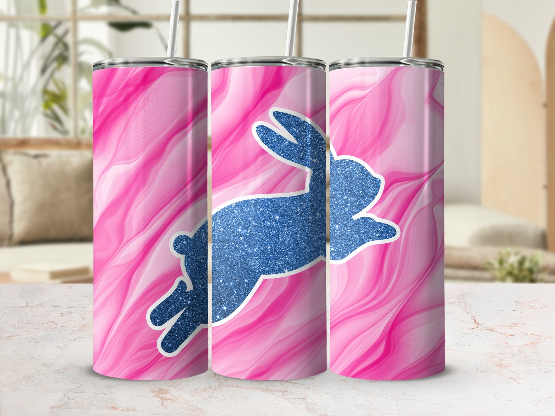 Pink marble tumbler with a sparkling blue glitter bunny silhouette.