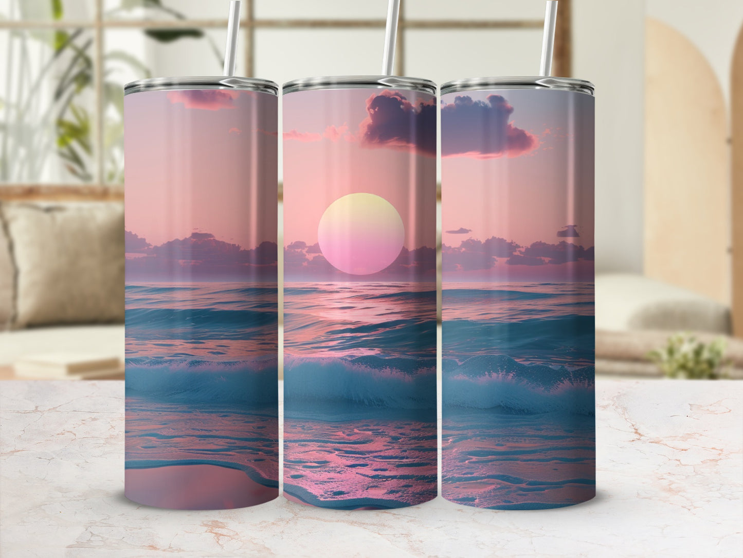 Tumbler with a sunset over ocean waves, pink and blue hues.