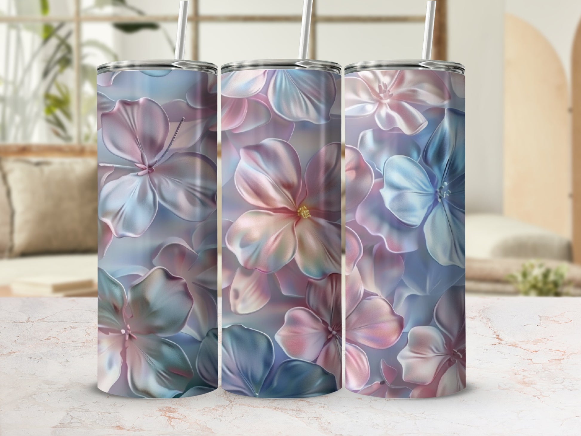 Three tumblers with a pastel floral pattern.