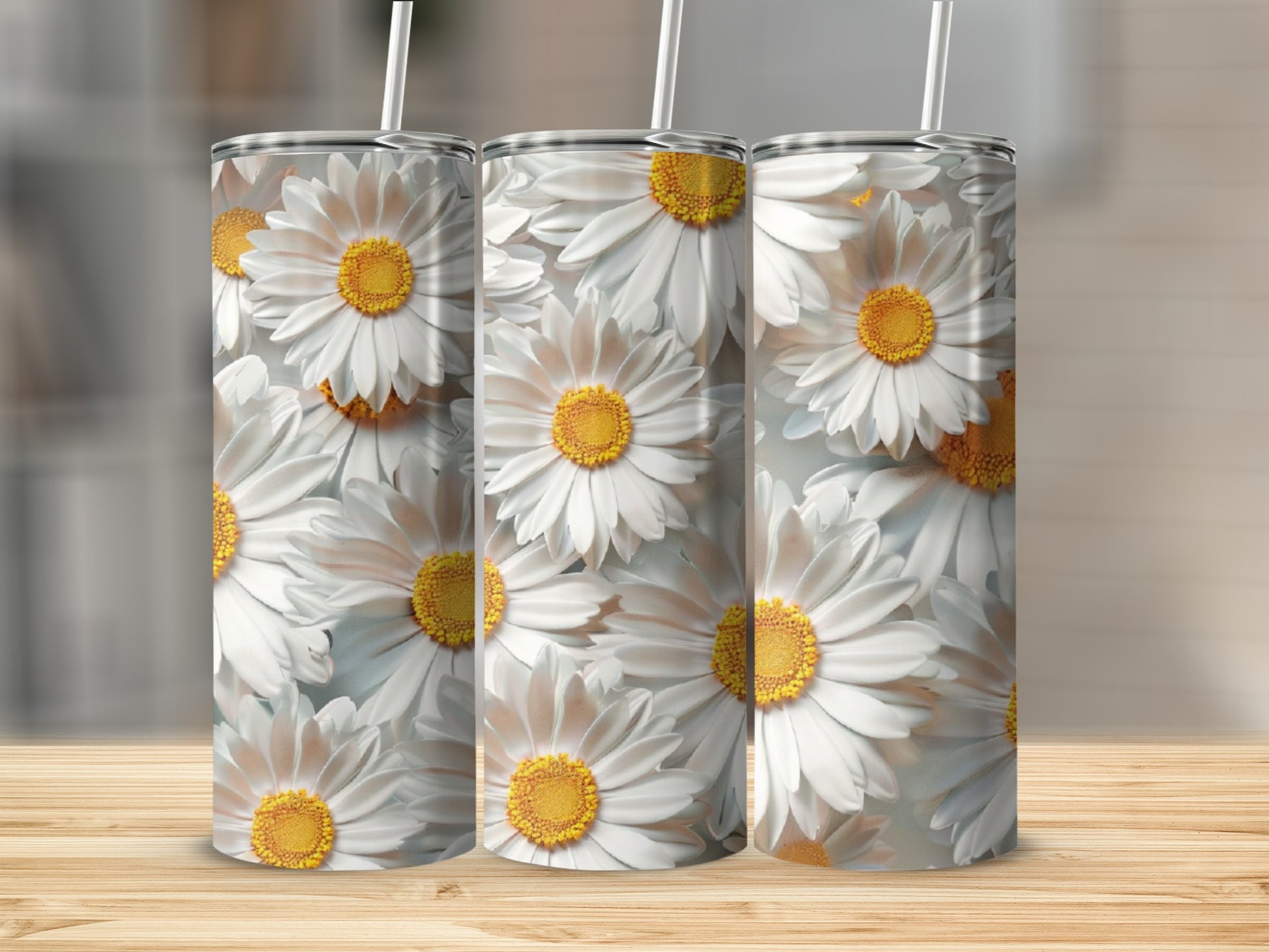 Three tumblers with a white daisy pattern.