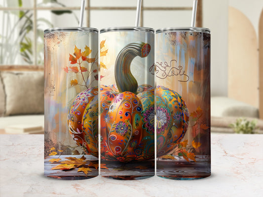 Trio of decorative tumblers featuring a colorful pumpkin and autumn leaves.