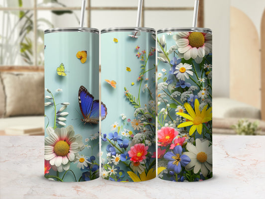 Light blue tumbler with colorful wildflowers and blue butterfly.