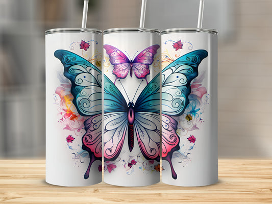 Three tumblers decorated with colorful watercolor butterflies and floral designs.